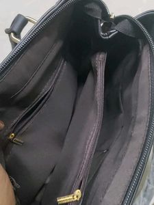 Stylish Black Handbag with Floral Embroidery