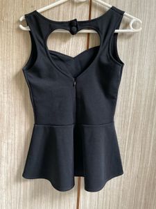 Chic Black Peplum Top with Heart Cutout