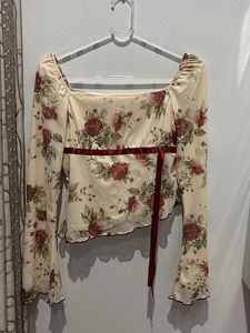 floral top with ribbon design- NOT WORN EVEN ONCE