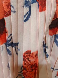 Pleated floral dress with front tie up