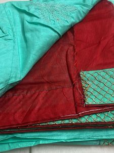 Elegant Teal Saree with Gold Embroidery
