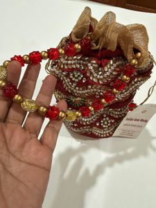 Brand new Maroon &amp; Embellished Potli Bag