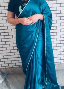 Elegant Teal Satin Saree with Pearl Embellishments