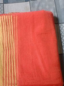 Vibrant Orange Saree with Golden Border