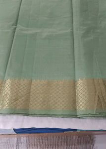 Elegant Light Green Saree with Golden Border