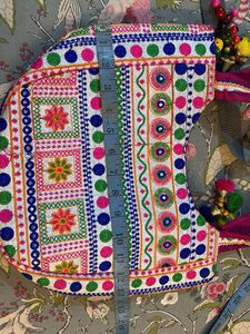 Embroidered Hobo Bag with Tassels