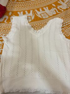 white pointelle knit sleeveless top