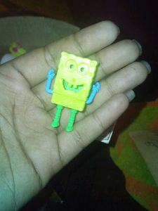 Vintage Toy Character with Wheels