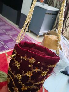 Embroidered Maroon Potli Bag