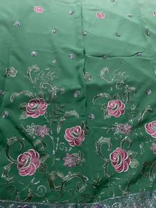 Embroidered Green saree with Floral Motifs