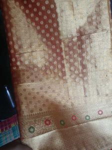 Beautiful Golden tissue saree with blouse piece