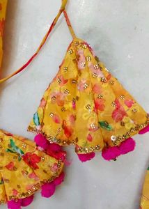 Yellow Floral Lehenga Choli with Pom-Pom Tassels