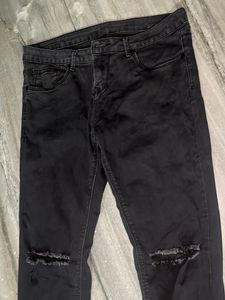 black distressed jeans