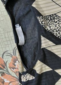 Stylish Geometric Print Top with Embellished Shoul