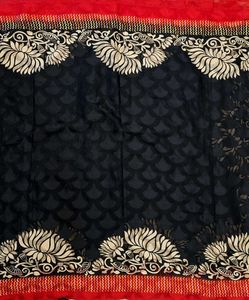 Elegant Black Saree with Floral Border