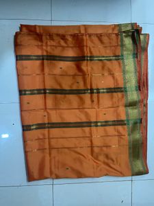 Orange Silk Saree with Gold Border