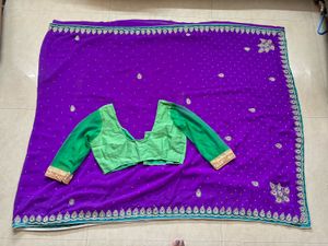 Purple Saree with Green Blouse