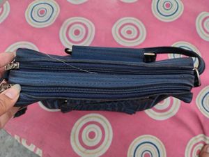 Stylish Blue Handbag with Bow Accent