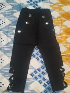 Stylish Black Pants with Decorative Buttons