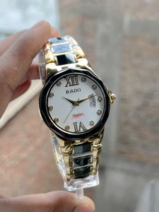 Rado* Dial: Black with crystal hour markers fr men