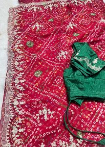 Elegant Red Bandhani Saree with Embellished Border