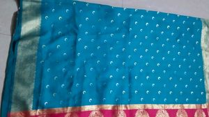 Beautiful Teal Saree with Pink Border