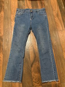 Flared Denim Jeans with Raw Hem