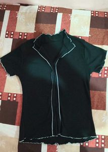 Chic Black Top with White Piping