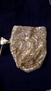 Golden sequined potli