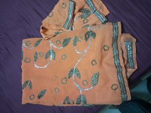 Elegant Orange Saree with Sequins