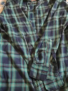Classic blue and teal checkered full-sleeve shirt.