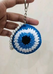 Combo keychain of evil eye and earth