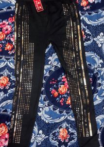 Stylish Black Jagging with Gold Embellishments