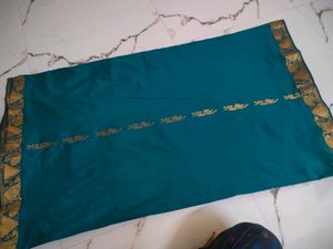 Teal Silk Saree with Gold Peacock Border
