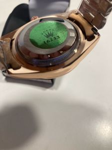 Rose Gold Rolex Watch with Green Dial