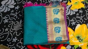 Teal Saree with Peacock Border