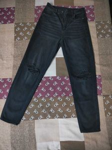 women knee cut jeans