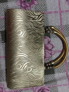 Elegant Gold Clutch Bag with Embellishments
