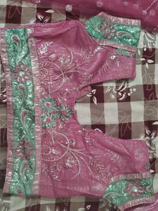 beautiful light magenta saree with stich blows and