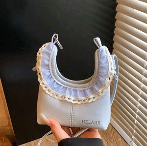 Chic Pastel Blue Ruffled Handbag