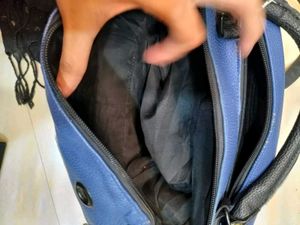 Stylish Blue Handbag with Eyelet Details