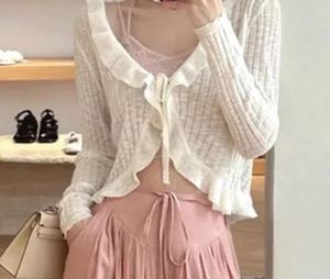 white ruffle top cardigan°•^`