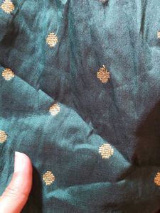 Bottle green brocade sleeveless kurti
