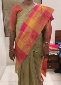 Elegant Gold Saree with detailed pink orange skirt