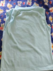 Pale Blue Sleeveless Mock Neck Top