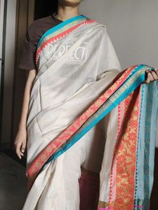 Elegant Cream Saree with Vibrant Border