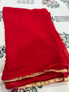 Vibrant Red Saree with Golden Border