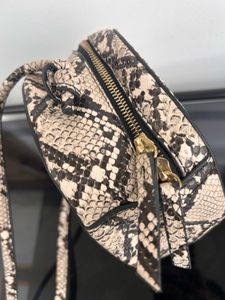 MANGO Round Snake Print Crossbody Bag