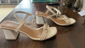 Elegant White heels with Detail