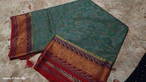 Exquisite Teal Saree with Red Blouse